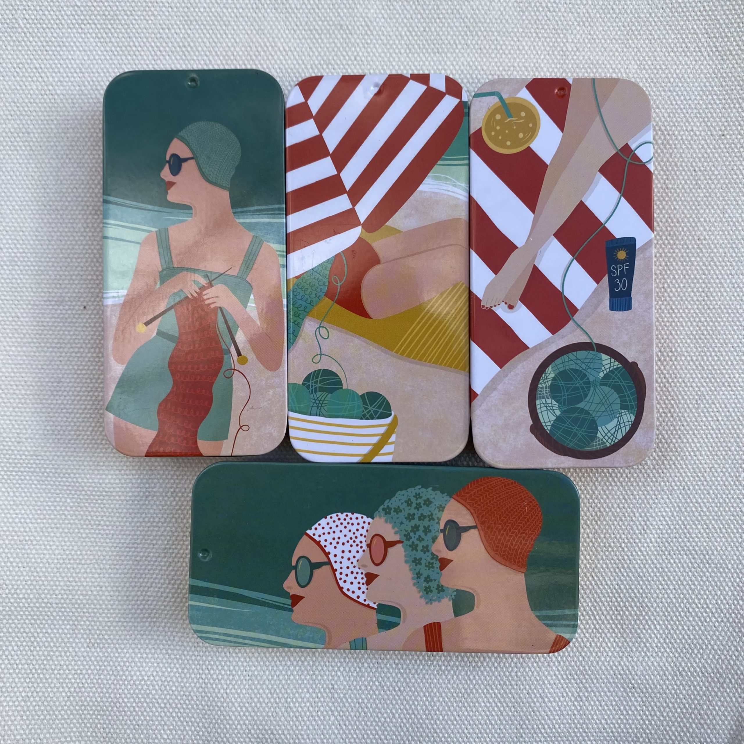 Fire metallbokser med retro motiv