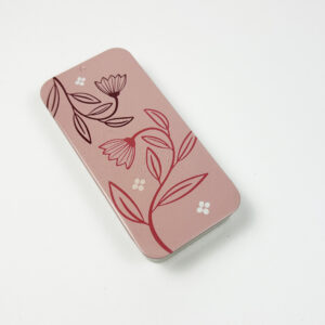 Elegant metallboks med rosa blosmtermotiv