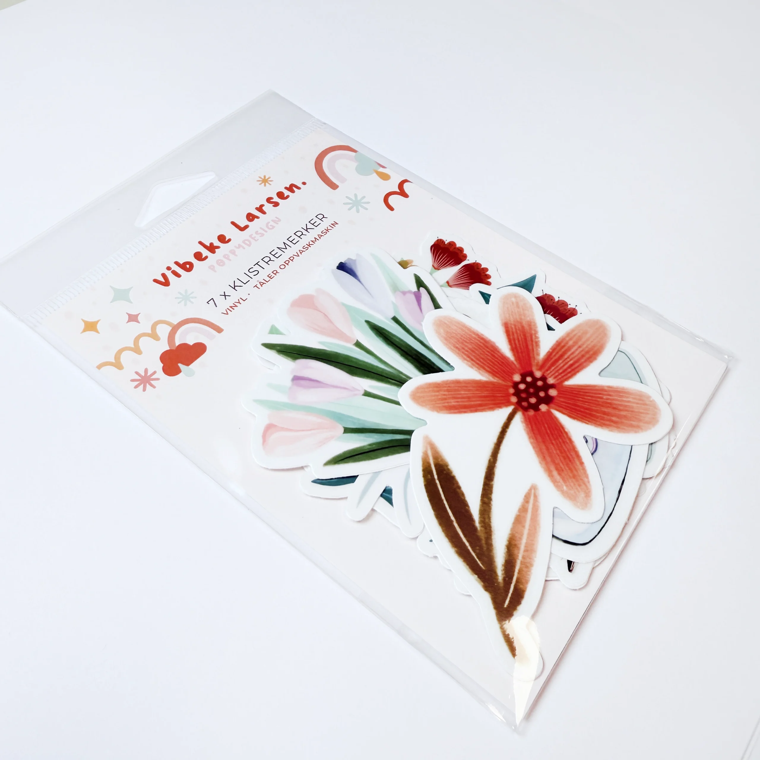 Bilde av klistremerkepakke sett fra siden