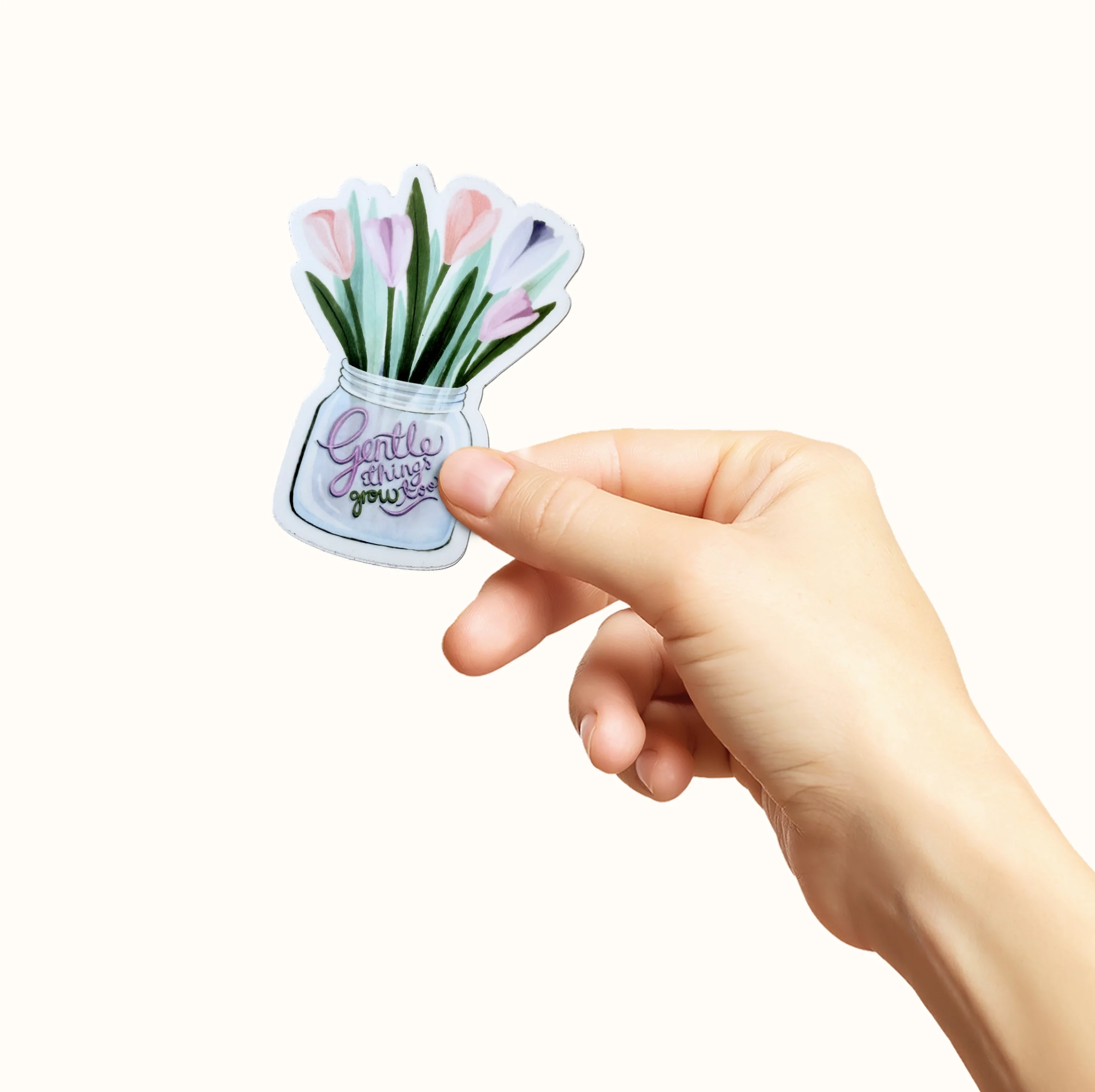 Klistremerke med teksten "gente things grow too"