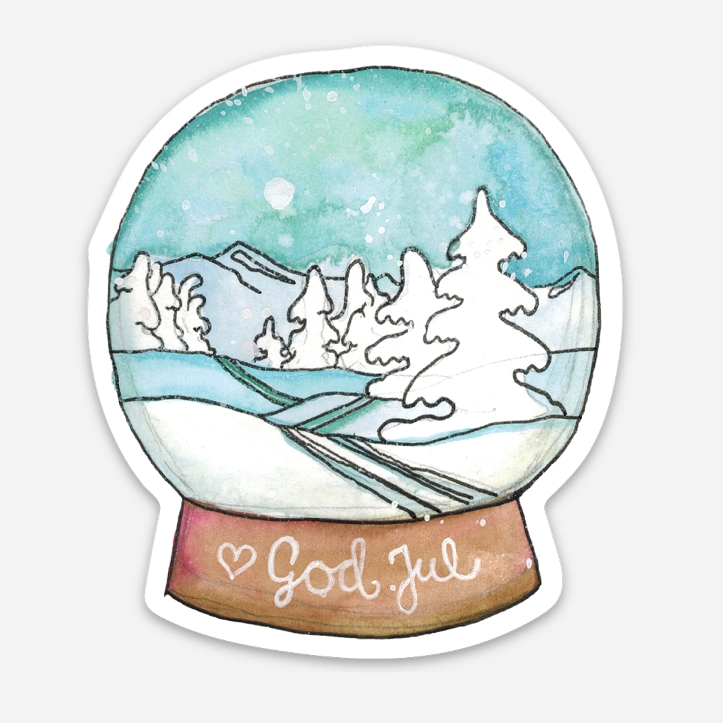 Klistremerke med vinterlandskap i snøkule